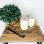 Load image into Gallery viewer, Coconut soy candles on wooden display with wick trimmer
