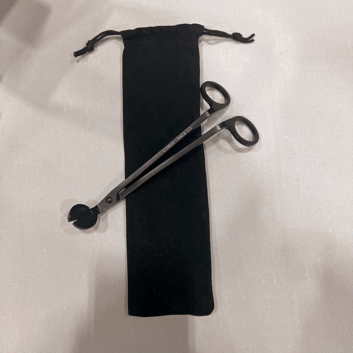 The Wick Trimmers. Citrus + Sage Co.