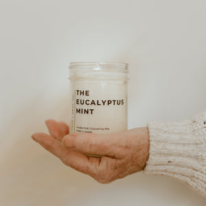 hand holding a candle