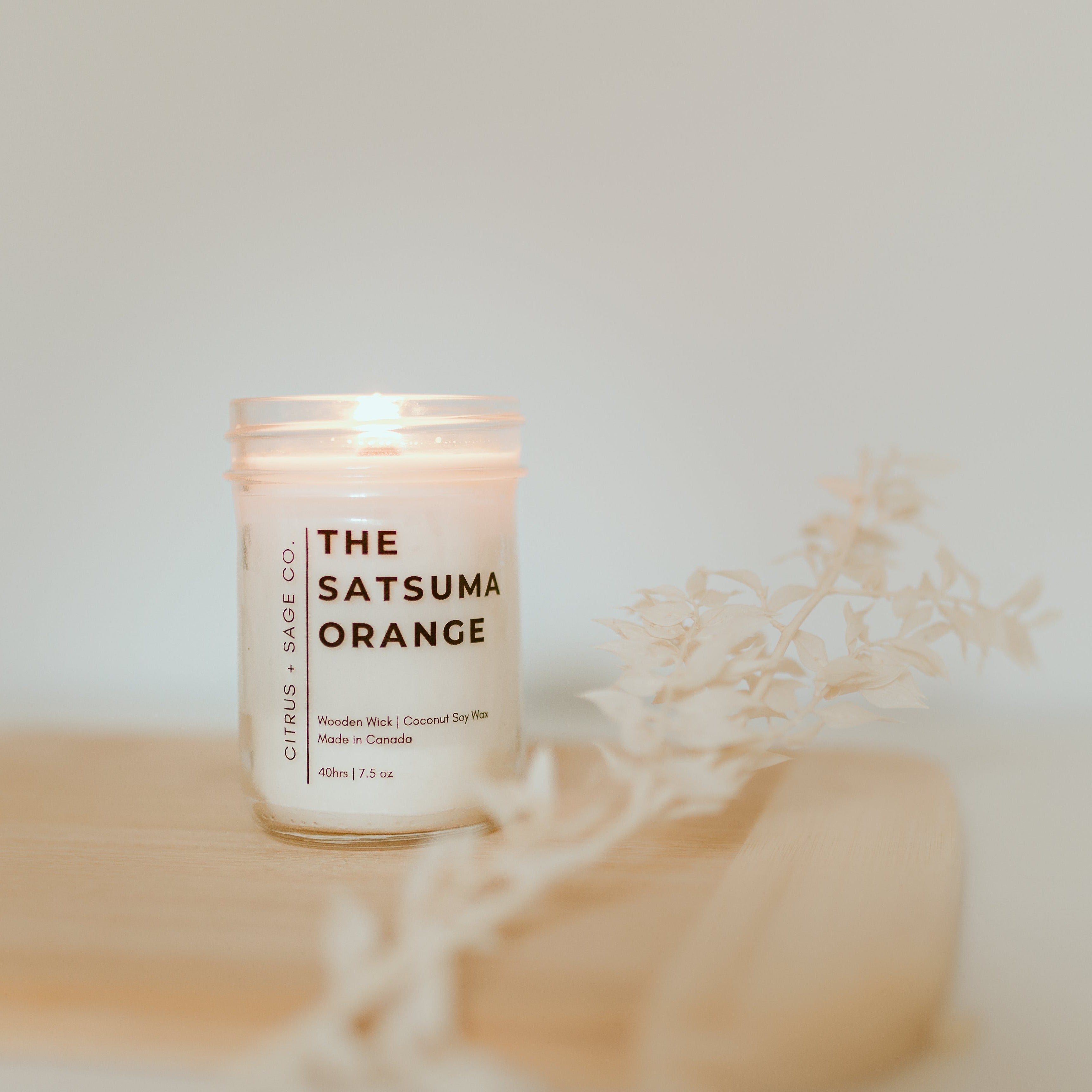 candle on wooden board