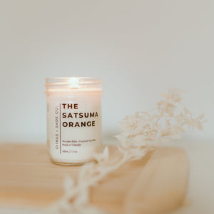 candle on wooden board