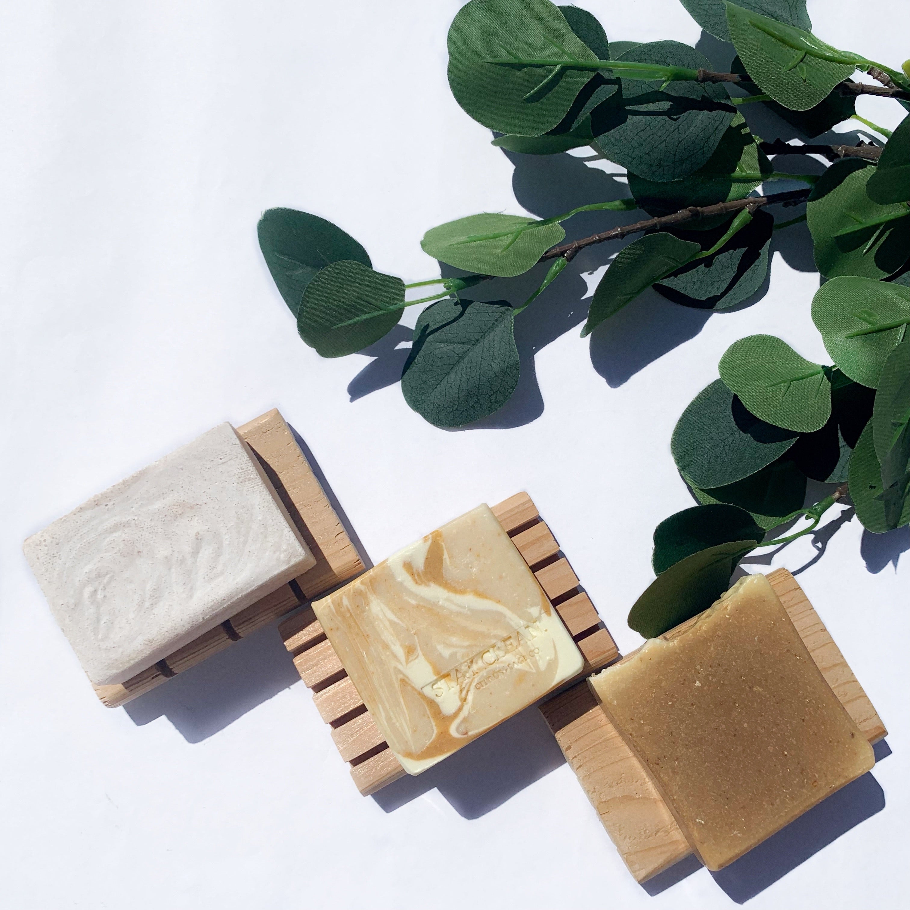 wooden soap dish with vegan soap displayed on top