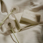 Load image into Gallery viewer, 2 bars of white soap on a beige sheet
